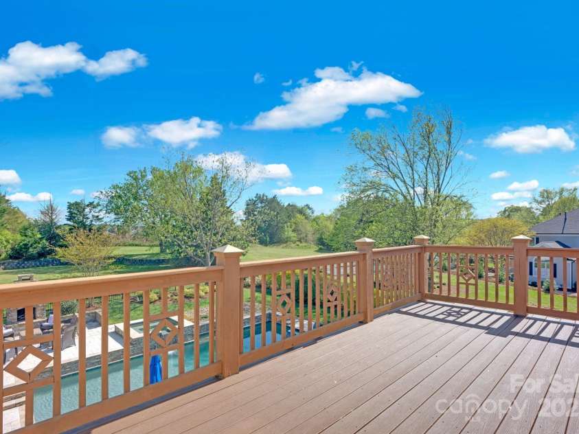 12932 Westmoreland Farm Road, Davidson, NC 28036.  MLS# CAR4243710, YatesRealty ID 19584. Deck accessible from primary suite