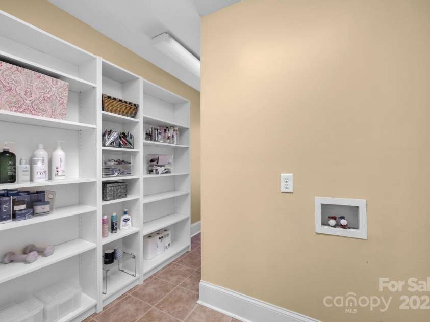 12932 Westmoreland Farm Road, Davidson, NC 28036.  MLS# CAR4243710, YatesRealty ID 19584. Second floor storage and laundry