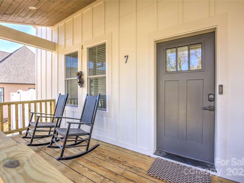 7 Mountain View Avenue, Black Mountain, NC 28711.  MLS# CAR4302734, YatesRealty ID 19585. Great porch for relaxing.