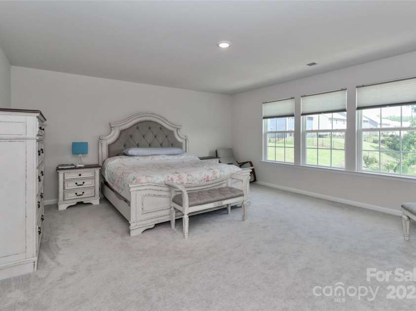 151 Outrigger Lane, Troutman, NC 28166.  MLS# CAR4268010, YatesRealty ID 19589. Primary bedroom