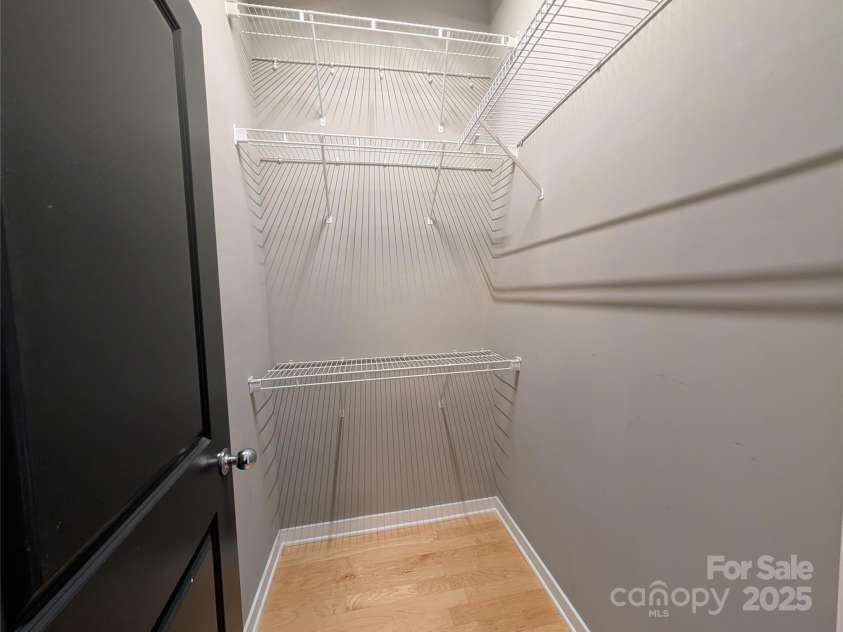 360 Exchange Street, Concord, NC 28027.  MLS# CAR4321208, YatesRealty ID 1959. Primary bedroom closet 