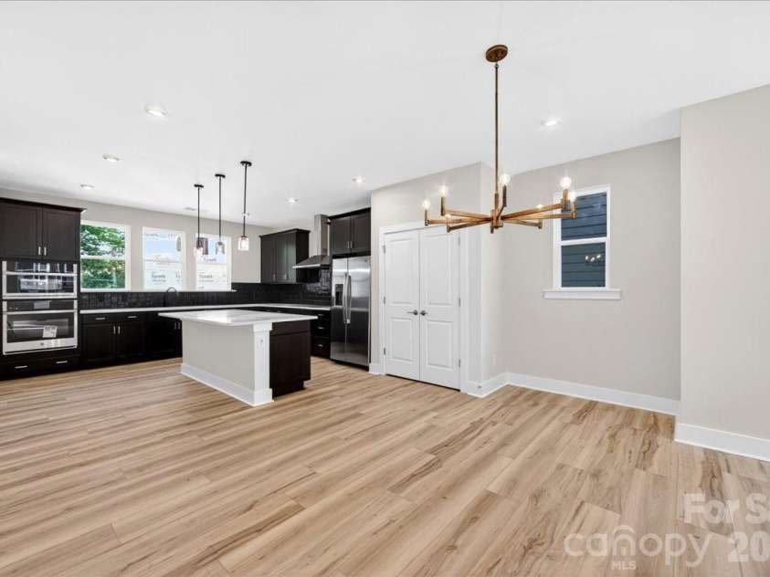 6022 Pivot Court, Charlotte, NC 28205.  MLS# CAR4370511, YatesRealty ID 19590. Dining space 