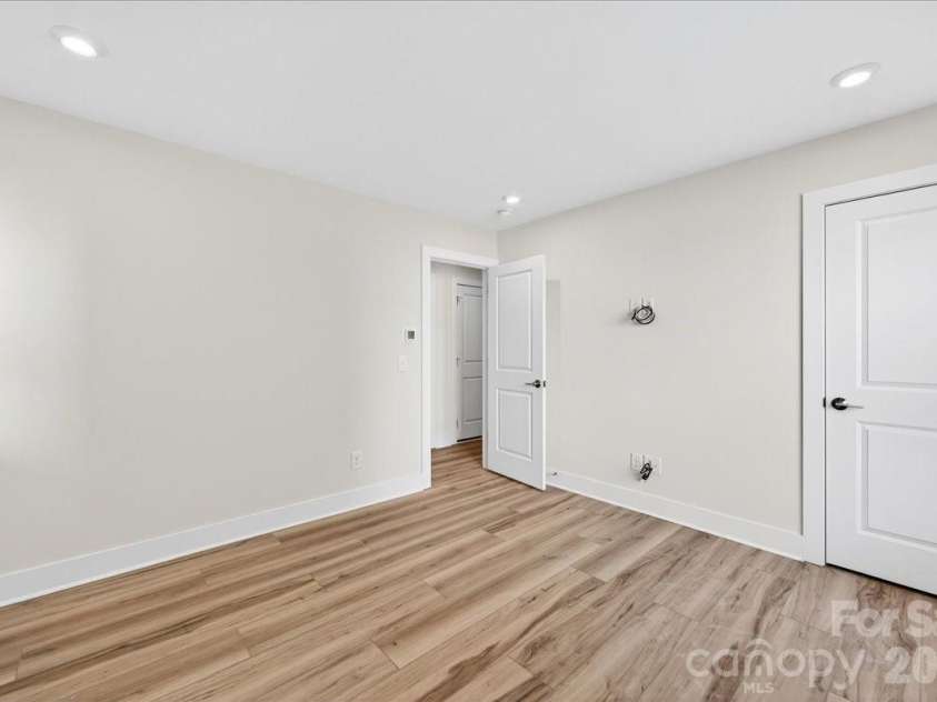 6022 Pivot Court, Charlotte, NC 28205.  MLS# CAR4370511, YatesRealty ID 19590. First floor bedroom