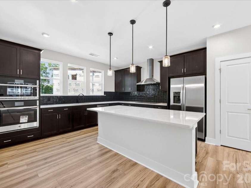 6022 Pivot Court, Charlotte, NC 28205.  MLS# CAR4370511, YatesRealty ID 19590. Gourmet Kitchen with appliances 