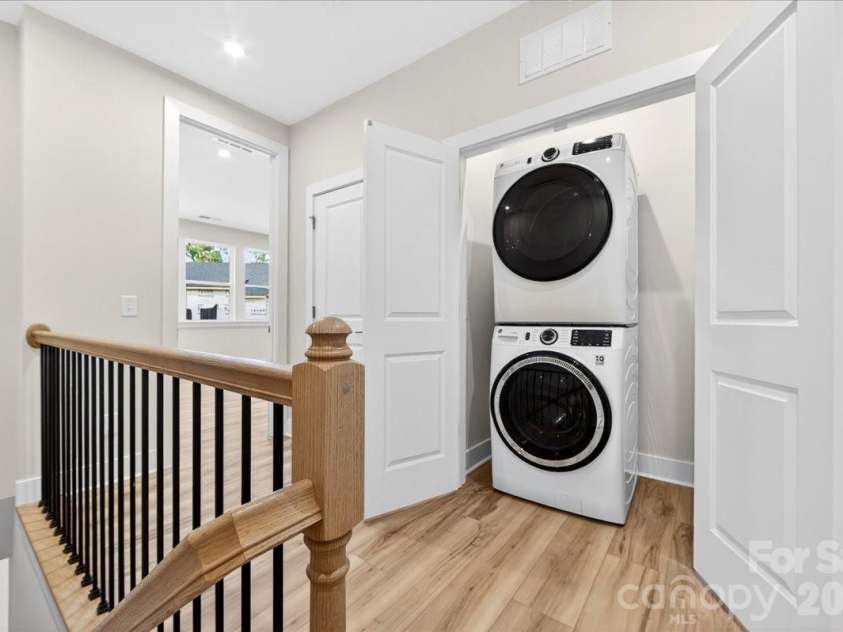 6022 Pivot Court, Charlotte, NC 28205.  MLS# CAR4370511, YatesRealty ID 19590. Laundry closet with washer & Dryer 