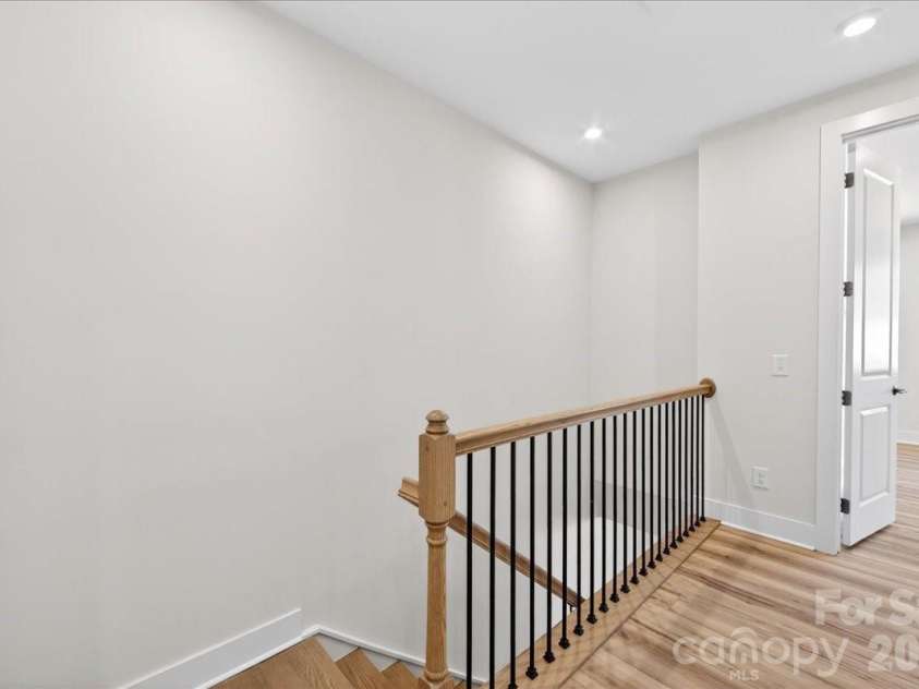 6022 Pivot Court, Charlotte, NC 28205.  MLS# CAR4370511, YatesRealty ID 19590. Third floor landing 