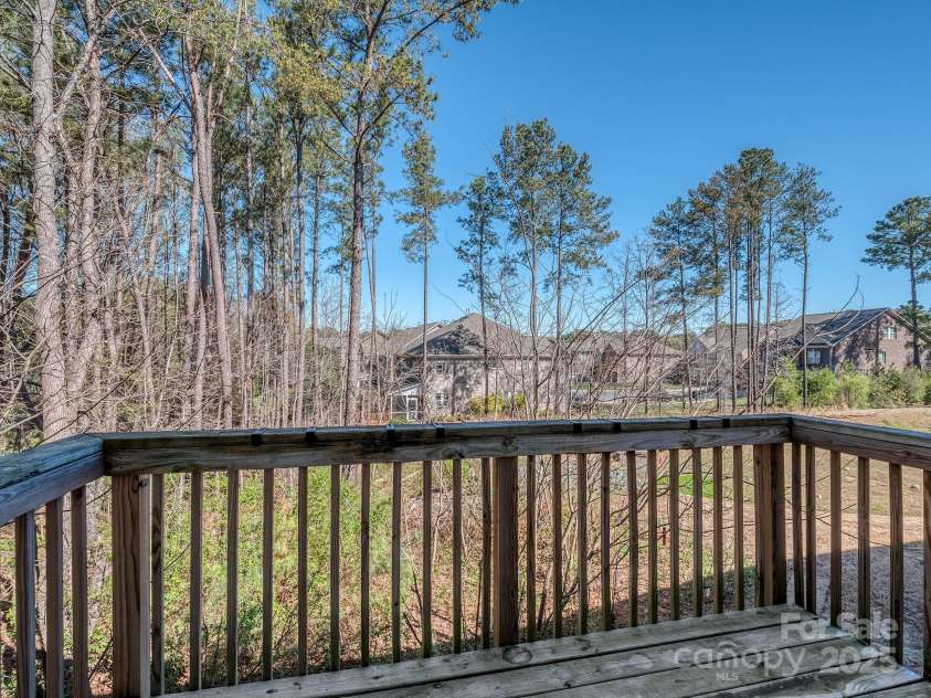 12214 Ardrey Park Drive, Charlotte, NC 28277.  MLS# CAR4247491, YatesRealty ID 19591. Deck off kitchen overlooks common area.