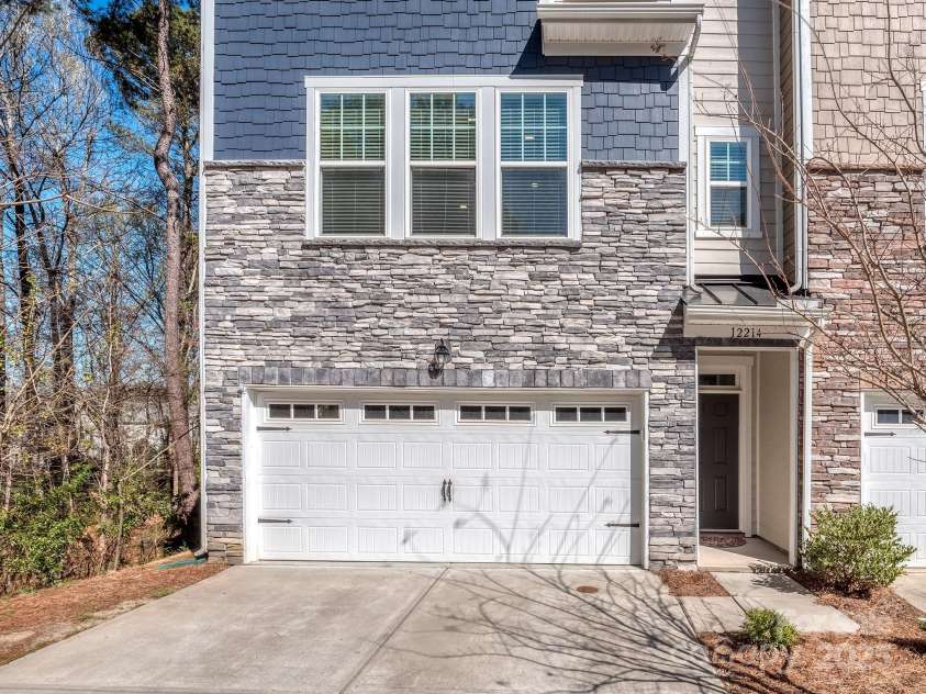 12214 Ardrey Park Drive, Charlotte, NC 28277.  MLS# CAR4247491, YatesRealty ID 19591. Fiber cement with brick & stone ornamentation.