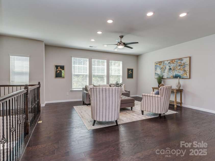 12214 Ardrey Park Drive, Charlotte, NC 28277.  MLS# CAR4247491, YatesRealty ID 19591. Great room overlooks soaring 2-story foyer, ornamented with decorative metal balusters.