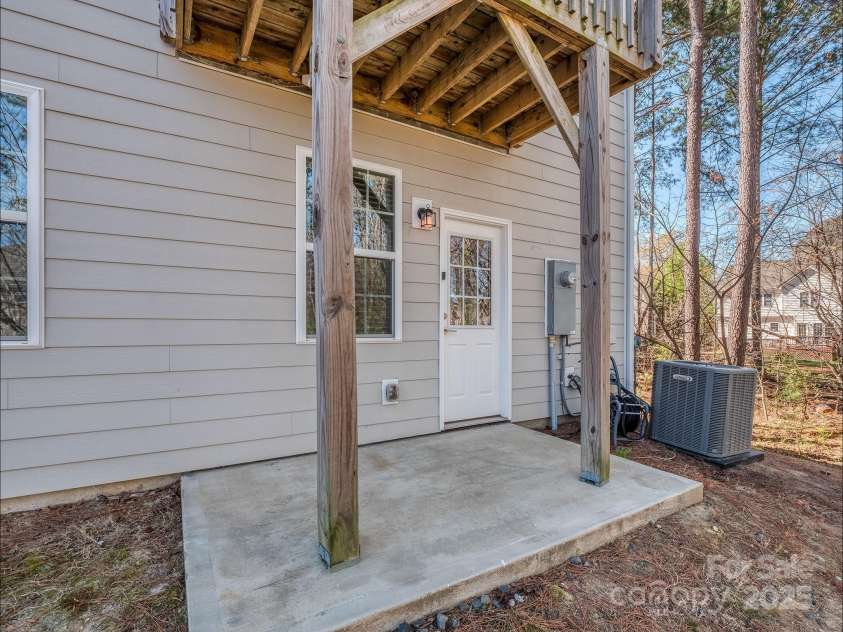12214 Ardrey Park Drive, Charlotte, NC 28277.  MLS# CAR4247491, YatesRealty ID 19591. Rear patio at main level.