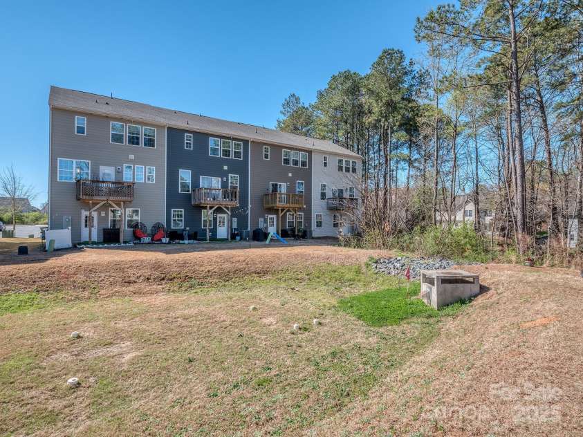 12214 Ardrey Park Drive, Charlotte, NC 28277.  MLS# CAR4247491, YatesRealty ID 19591. Rear view across common area.