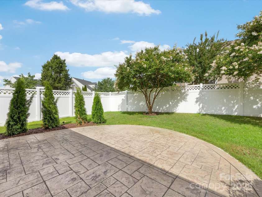 8603 Robinson Meadow Court, Charlotte, NC 28277.  MLS# CAR4265734, YatesRealty ID 19593. A beautiful paver patio adds to the enjoyment of the backyard!