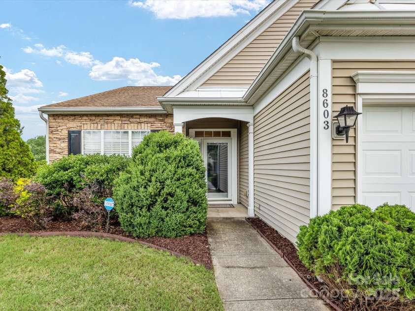 8603 Robinson Meadow Court, Charlotte, NC 28277.  MLS# CAR4265734, YatesRealty ID 19593. Covered front porch entry.
