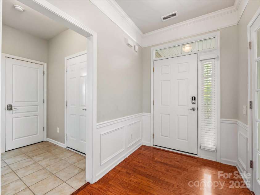 8603 Robinson Meadow Court, Charlotte, NC 28277.  MLS# CAR4265734, YatesRealty ID 19593. Foyer with prefinished hardwood floors.