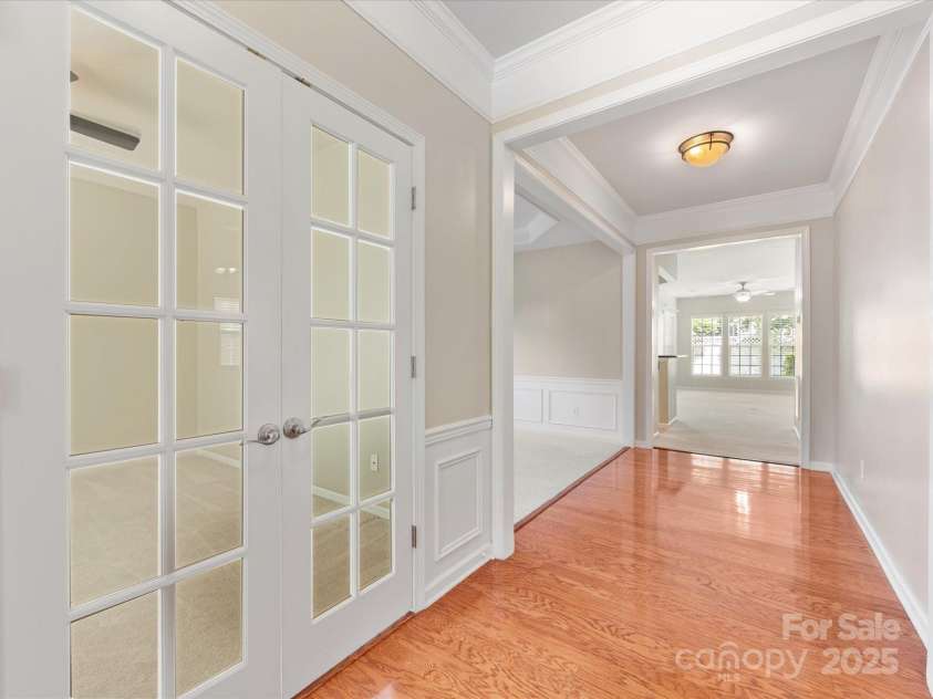 8603 Robinson Meadow Court, Charlotte, NC 28277.  MLS# CAR4265734, YatesRealty ID 19593. French doors lead to an office at the front of the home.
