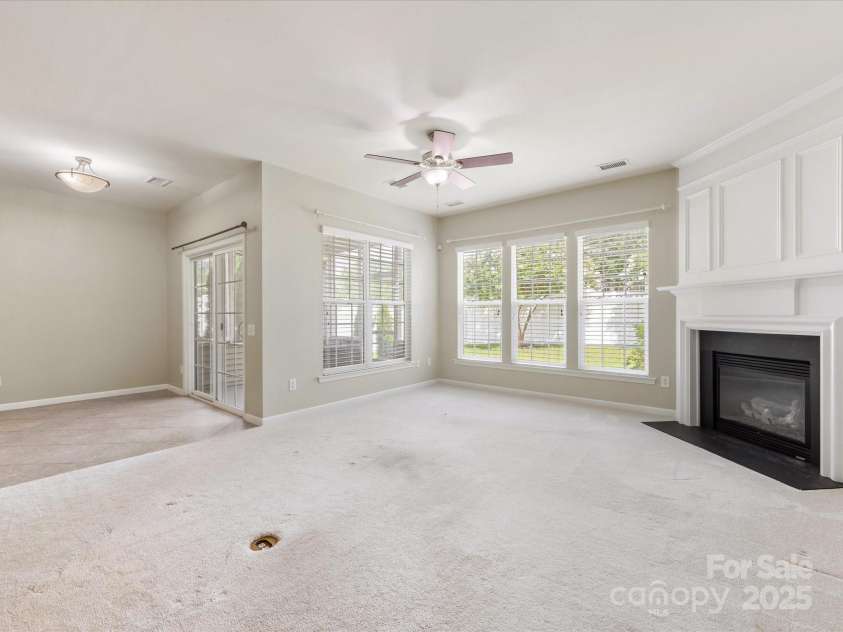8603 Robinson Meadow Court, Charlotte, NC 28277.  MLS# CAR4265734, YatesRealty ID 19593. The family room  has abundant natural light.