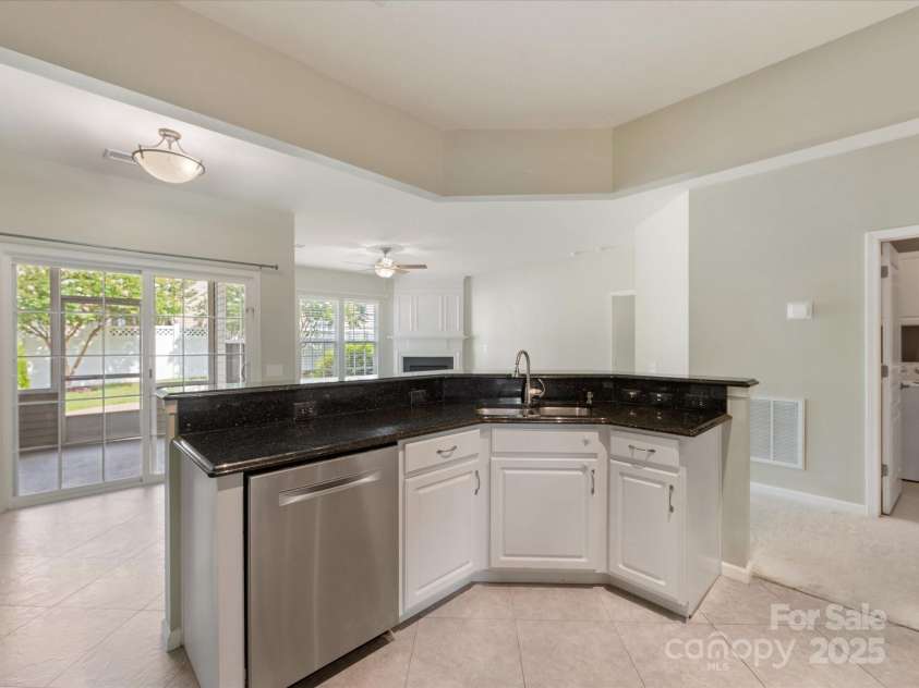 8603 Robinson Meadow Court, Charlotte, NC 28277.  MLS# CAR4265734, YatesRealty ID 19593. The kitchen is open to the breakfast nook and family room for enjoyment of daily living and entertaining.