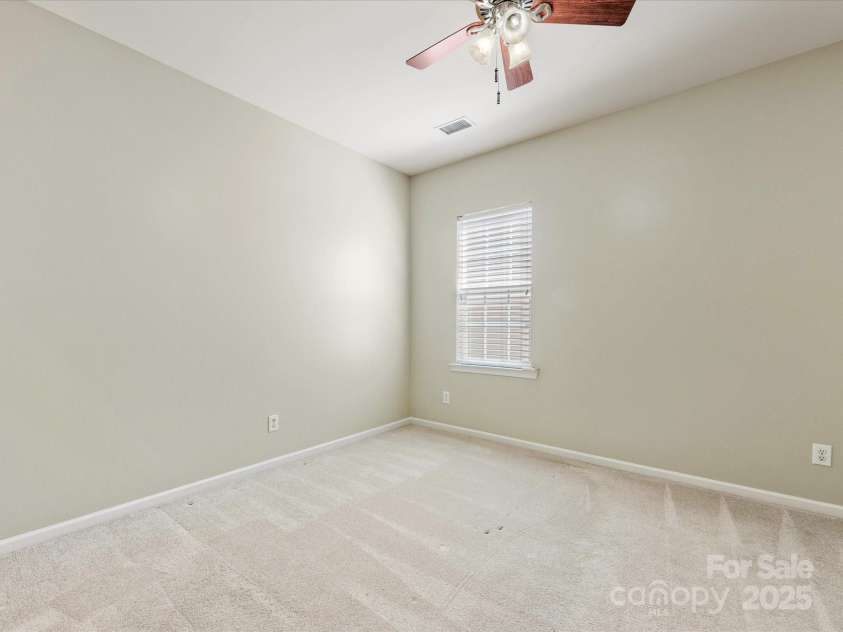 8603 Robinson Meadow Court, Charlotte, NC 28277.  MLS# CAR4265734, YatesRealty ID 19593. The second bedroom is separated from the primary suite.