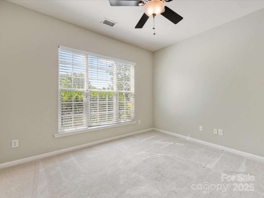 8603 Robinson Meadow Court, Charlotte, NC 28277.  MLS# CAR4265734, YatesRealty ID 19593. There is a ceiling fan in the office as well.