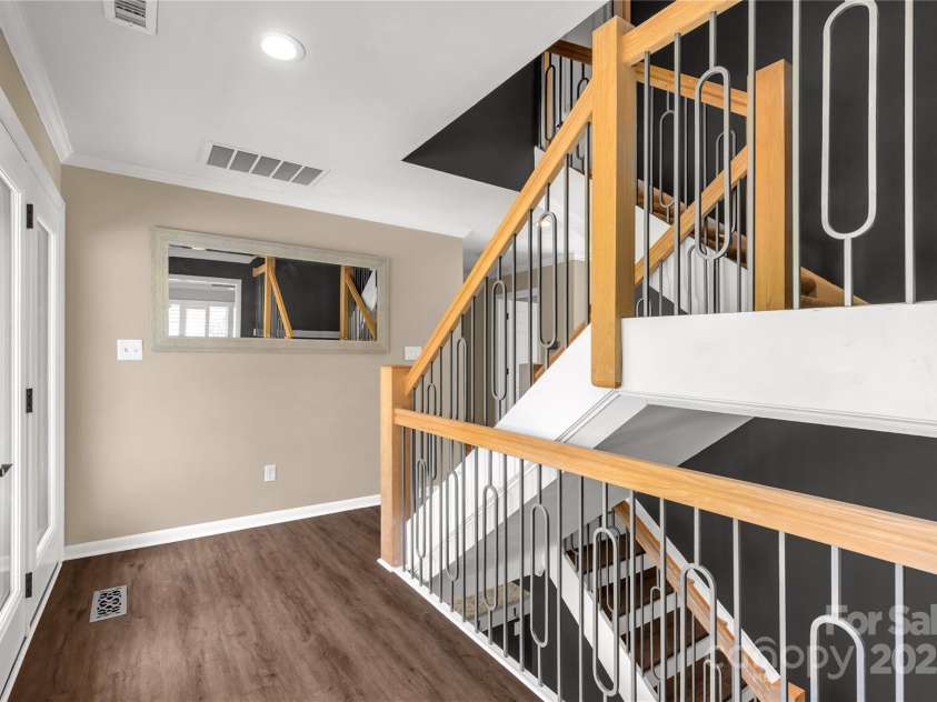 22 Honeysuckle Lane, Clover, SC 29710.  MLS# CAR4266746, YatesRealty ID 19603. Main level stair case