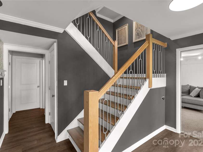22 Honeysuckle Lane, Clover, SC 29710.  MLS# CAR4266746, YatesRealty ID 19603. Stair case on upper level up to bonus room