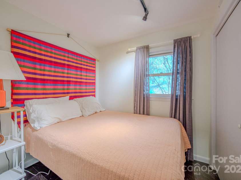 10 Clearbrook Road, Asheville, NC 28805.  MLS# CAR4238252, YatesRealty ID 19609. Guest Bedroom lower level.