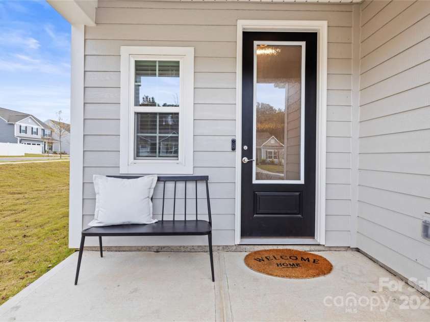 159 Tanner Loop, Troutman, NC 28166.  MLS# CAR4196119, YatesRealty ID 1961. Front Porch