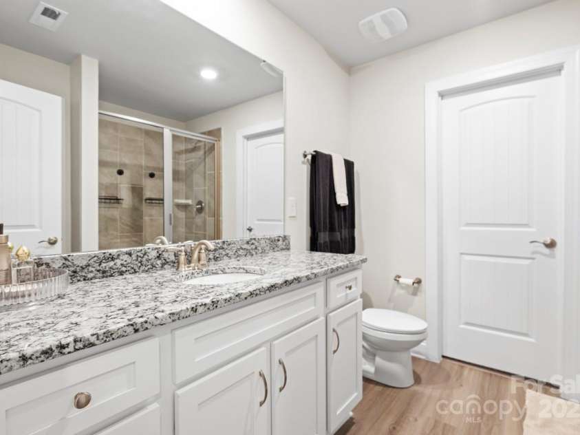 159 Tanner Loop, Troutman, NC 28166.  MLS# CAR4196119, YatesRealty ID 1961. Primary Bathroom