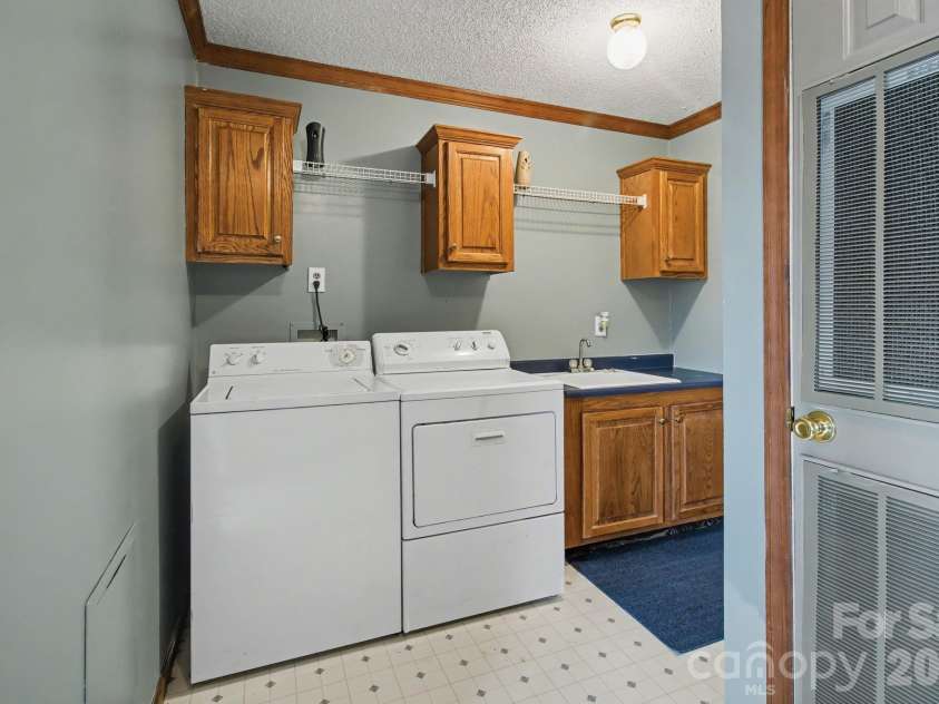 74 Chambers Road, Weaverville, NC 28787.  MLS# CAR4364080, YatesRealty ID 19610. Laundry Room
