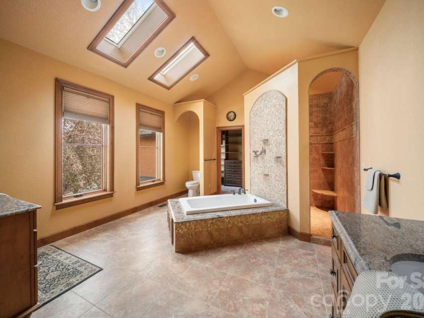 98 Scarlett Drive, Pisgah Forest, NC 28768.  MLS# CAR4360950, YatesRealty ID 19613. Primary bathroom