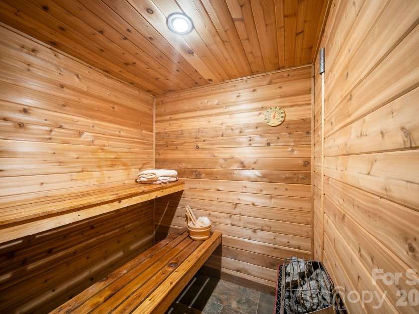 98 Scarlett Drive, Pisgah Forest, NC 28768.  MLS# CAR4360950, YatesRealty ID 19613. Sauna 
