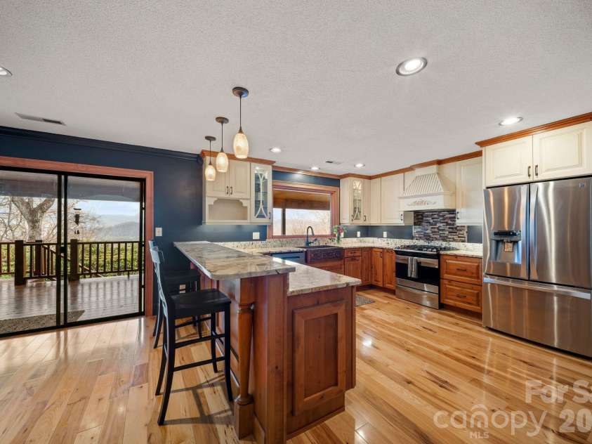 98 Scarlett Drive, Pisgah Forest, NC 28768.  MLS# CAR4360950, YatesRealty ID 19613. Views from kitchen