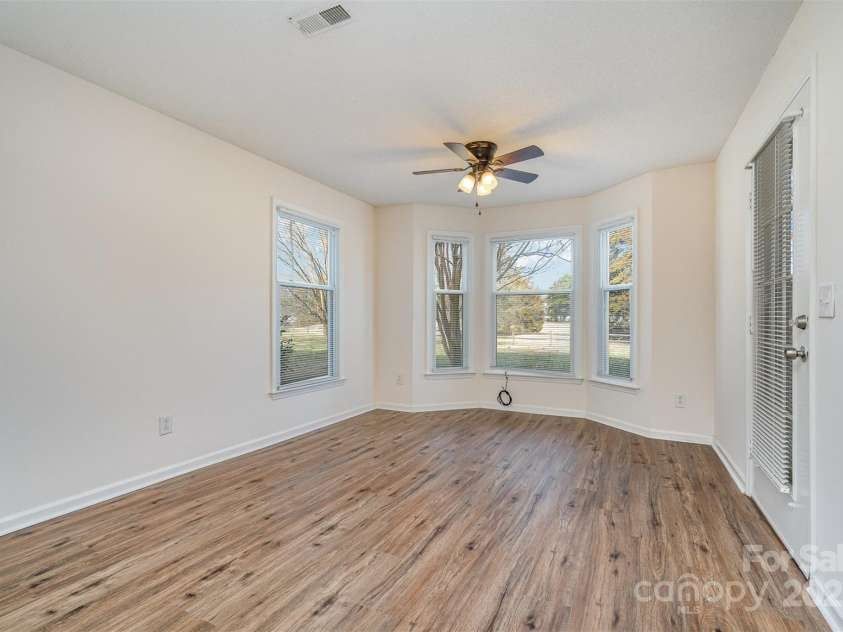 10240 Rose Meadow Lane, Charlotte, NC 28277.  MLS# CAR4213685, YatesRealty ID 19614. A different view of the living area with open floor plan
