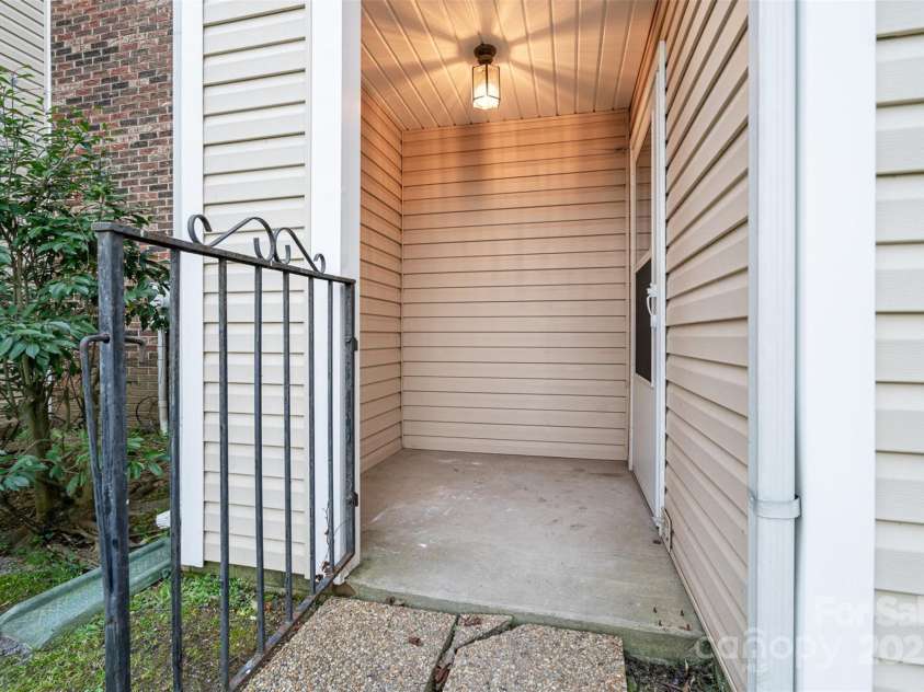 10240 Rose Meadow Lane, Charlotte, NC 28277.  MLS# CAR4213685, YatesRealty ID 19614. Cute Back Porch