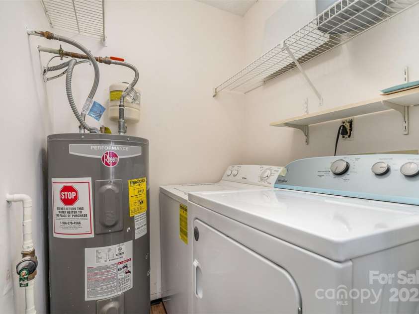 10240 Rose Meadow Lane, Charlotte, NC 28277.  MLS# CAR4213685, YatesRealty ID 19614. Laundry room with washer/dryer