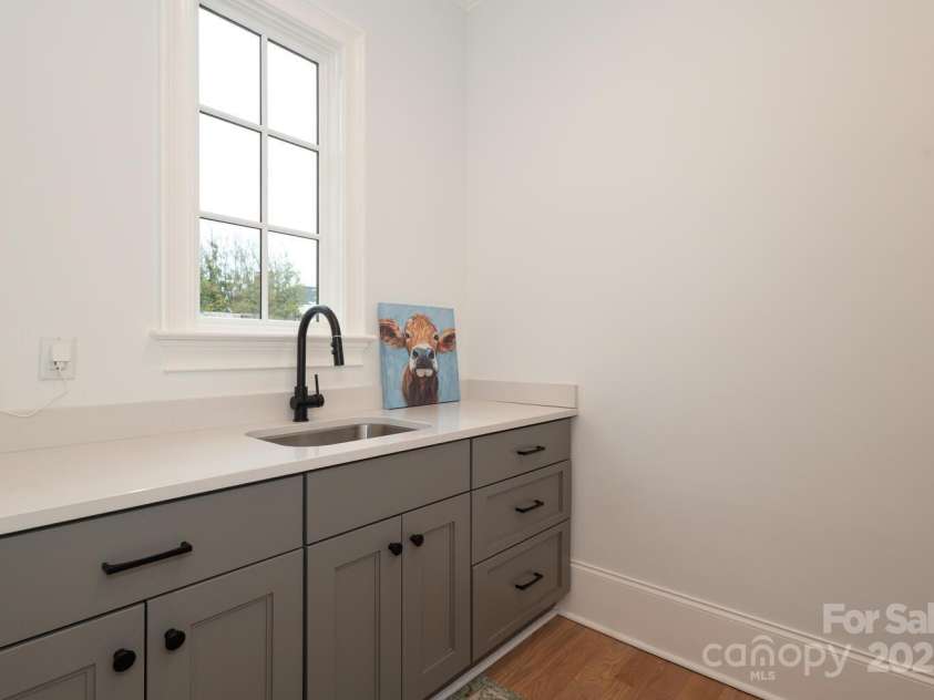 3119 Knowlton Lane, Charlotte, NC 28205.  MLS# CAR4297838, YatesRealty ID 19616. Laundry room