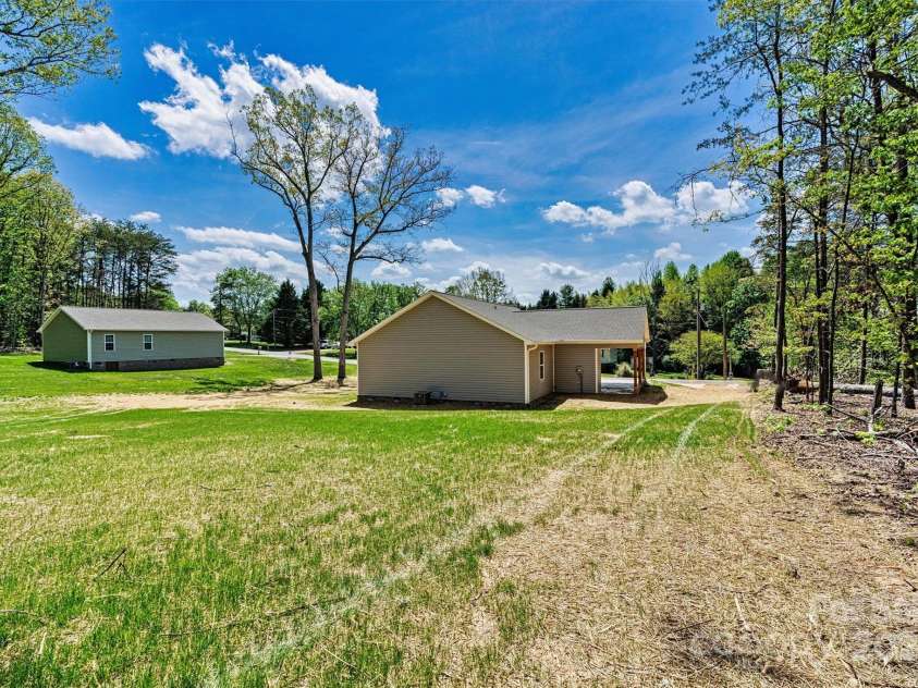 102 Kerda Street, Taylorsville, NC 28681.  MLS# CAR4244312, YatesRealty ID 19617. Back Yard Focused View