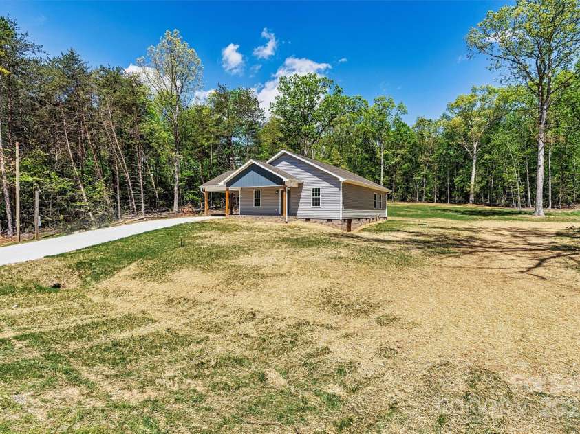 102 Kerda Street, Taylorsville, NC 28681.  MLS# CAR4244312, YatesRealty ID 19617. Front and Side Yard View