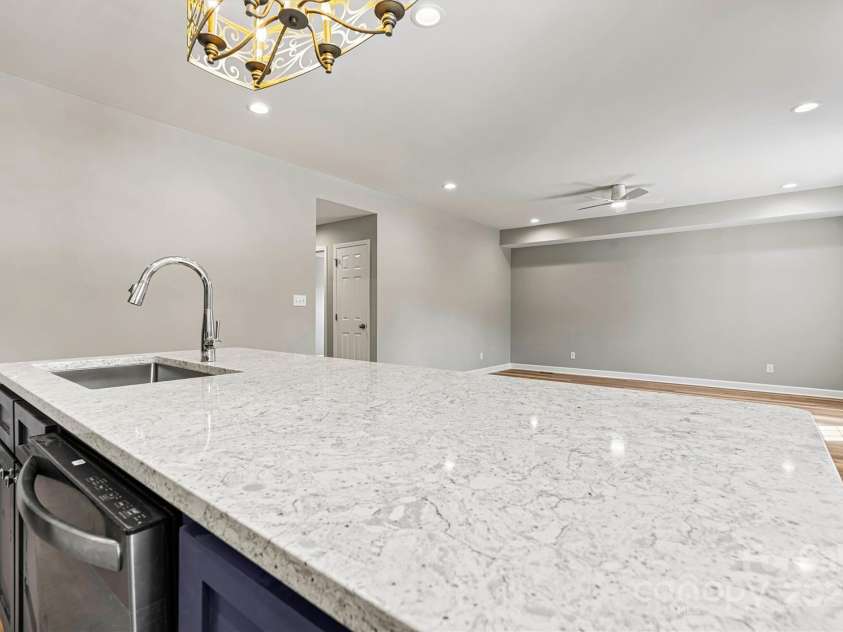 102 Kerda Street, Taylorsville, NC 28681.  MLS# CAR4244312, YatesRealty ID 19617. Open Concept Kitchen/Dining/Living Room View