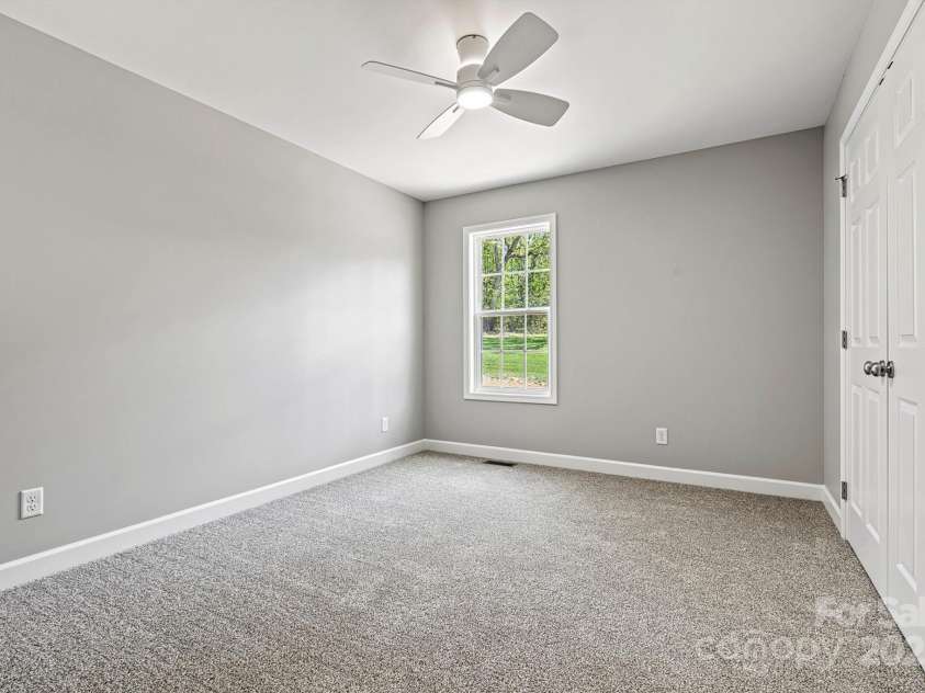 102 Kerda Street, Taylorsville, NC 28681.  MLS# CAR4244312, YatesRealty ID 19617. Second Bedroom/Window View