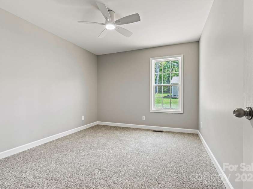 102 Kerda Street, Taylorsville, NC 28681.  MLS# CAR4244312, YatesRealty ID 19617. Third Bedroom/Window View