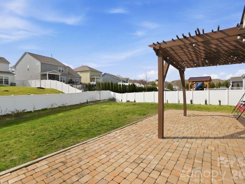 4029 Spring Garden Street, Fort Mill, SC 29715.  MLS# CAR4354877, YatesRealty ID 19618. Back yard is waiting for fun