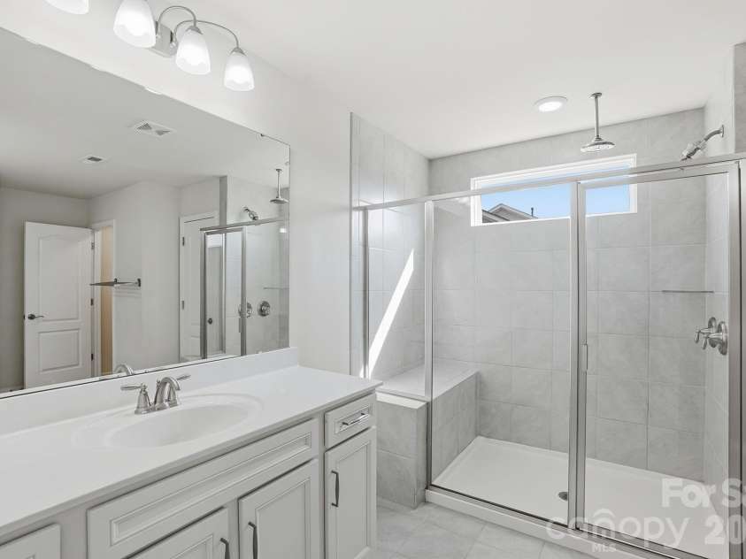 4029 Spring Garden Street, Fort Mill, SC 29715.  MLS# CAR4354877, YatesRealty ID 19618. Shower in Primary bathroom