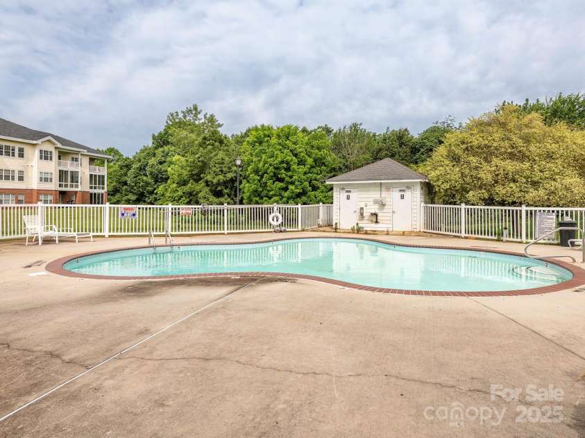 8747 Coralbell Lane, Charlotte, NC 28213.  MLS# CAR4258950, YatesRealty ID 19619. Community pool