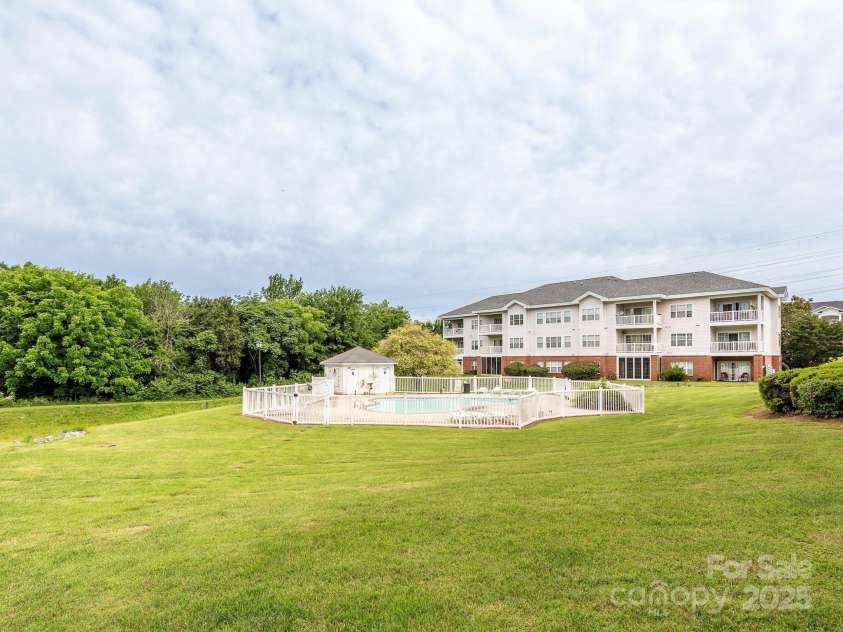 8747 Coralbell Lane, Charlotte, NC 28213.  MLS# CAR4258950, YatesRealty ID 19619. Community pool