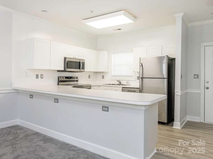 8747 Coralbell Lane, Charlotte, NC 28213.  MLS# CAR4258950, YatesRealty ID 19619. Kitchen