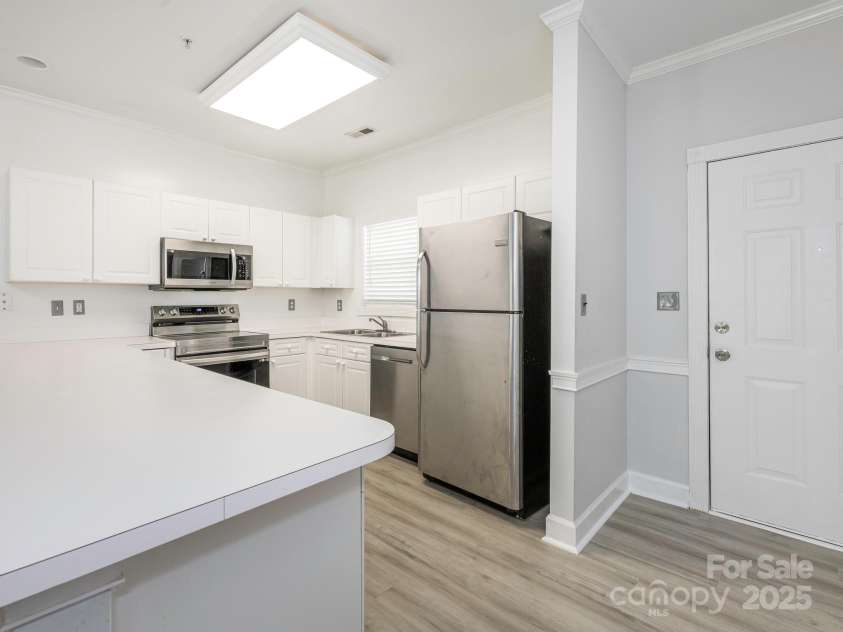 8747 Coralbell Lane, Charlotte, NC 28213.  MLS# CAR4258950, YatesRealty ID 19619. Kitchen