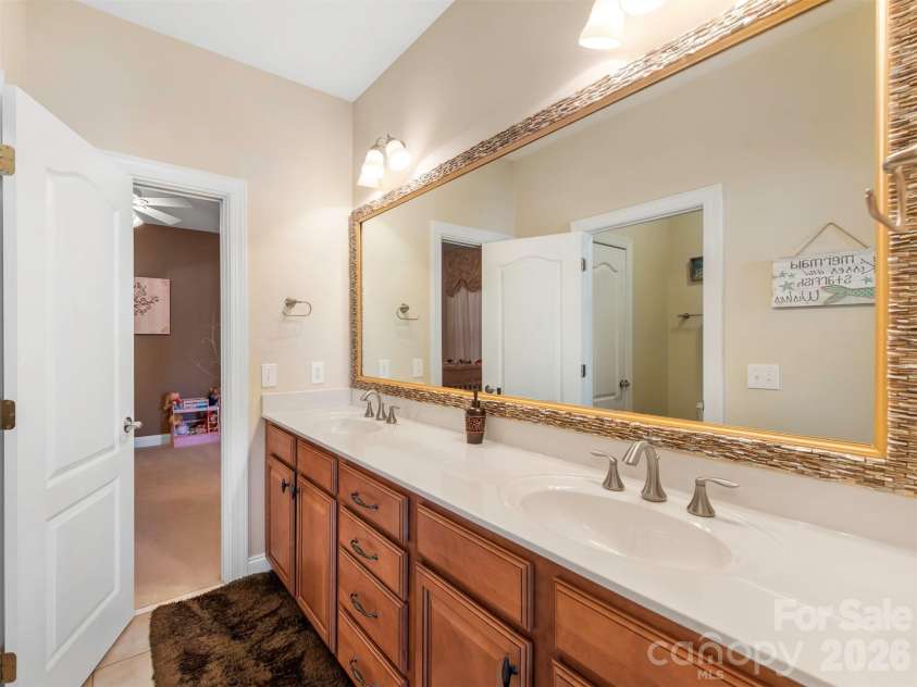 8638 Savannah Road, Harrisburg, NC 28075.  MLS# CAR4372561, YatesRealty ID 19620. 3rd Full Bath connected to 4th Bedroom!