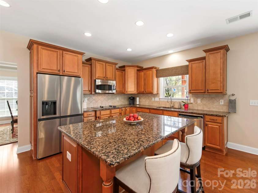 8638 Savannah Road, Harrisburg, NC 28075.  MLS# CAR4372561, YatesRealty ID 19620. Large Open Kitchen with over-sized Kitchen Island