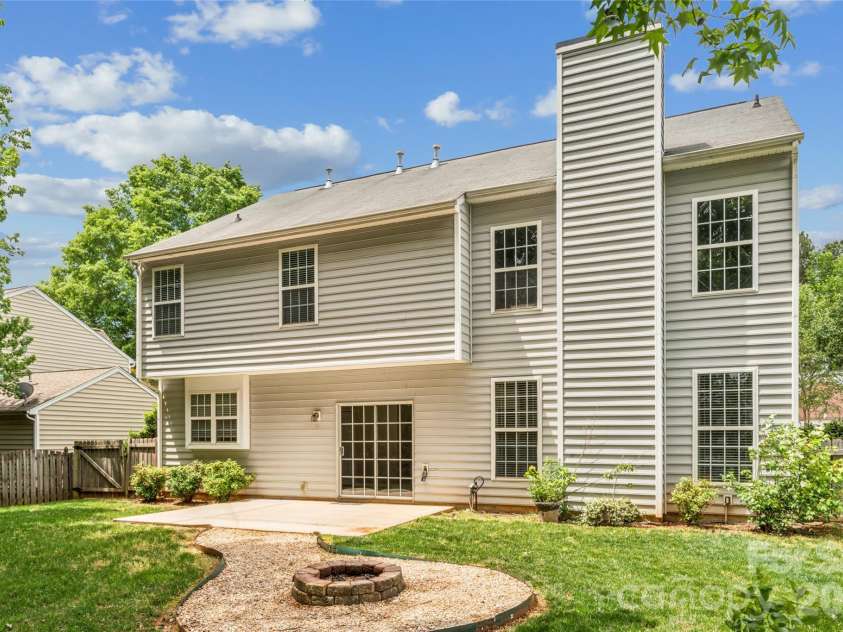 1206 Arrow Lake Court, Fort Mill, SC 29707.  MLS# CAR4371326, YatesRealty ID 19622. Backyard with firepit